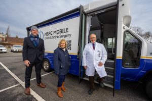 Town of Islip Supervisor Angie Carpenter (c) joined NSPC neurosurgeon William Sonstein, MD (r) at the launch of the new NSPC Mobile Service.